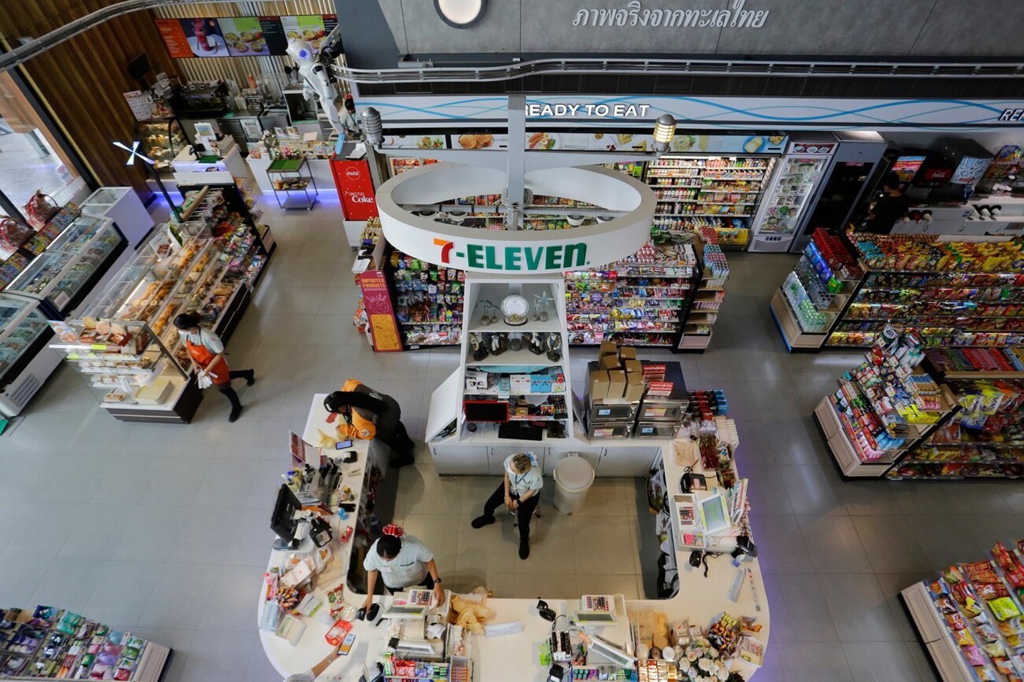 Pattaya, Thailand - May 25, 2023: Aerial view of a 24h 7-Eleven convenience store located in the coastal city of Pattaya, near Bangkok. This shop is considered the World's largest 7-11.; Shutterstock ID 2308430039