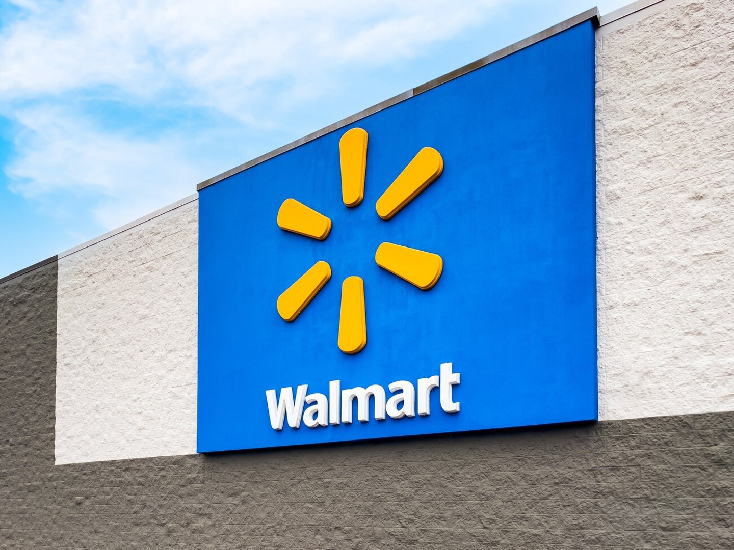 EATONTON, GEORGIA - DECEMBER 6 2023 : Exterior view of Walmart store logo sign. Founded by Sam Walton in 1962, Walmart operates a chain of discount retail and grocery stores.; Shutterstock ID 2397538243