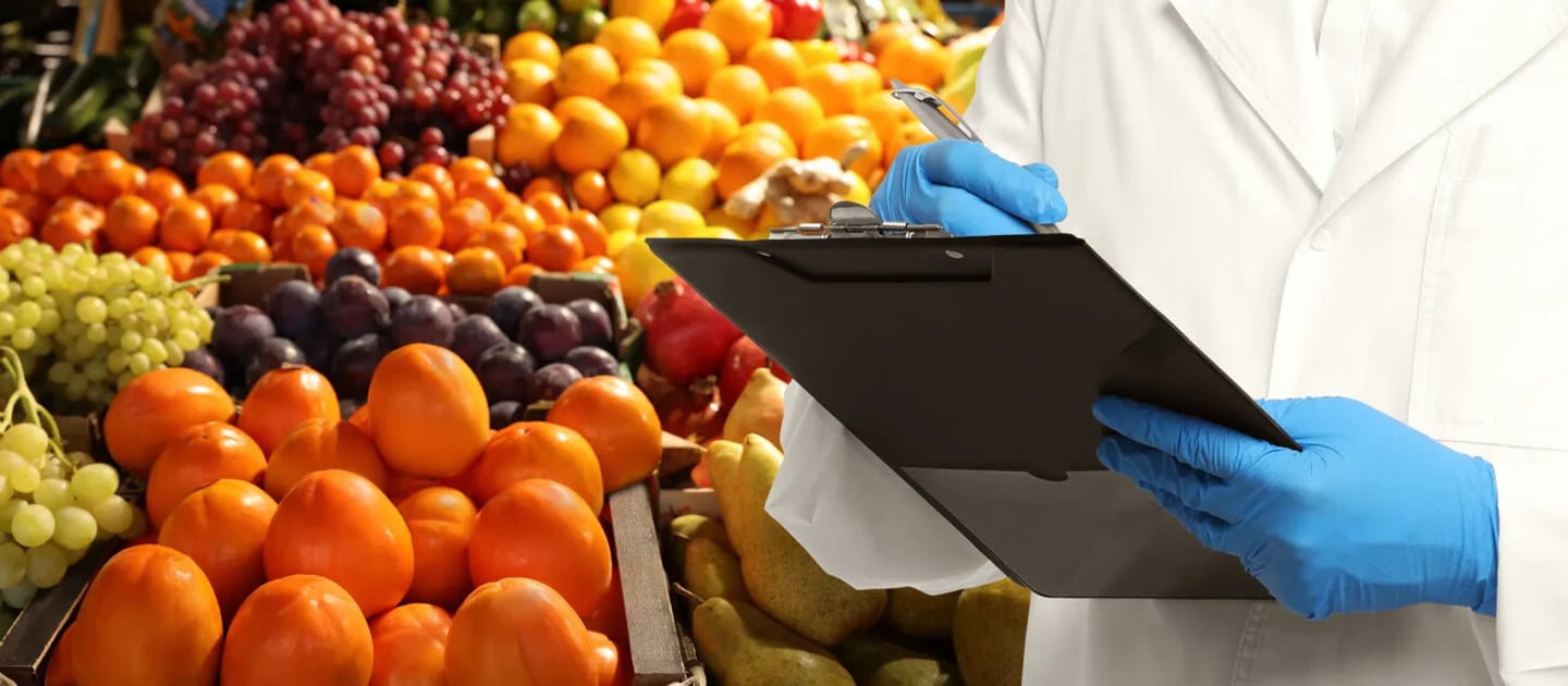 Food quality control specialist examining fruits at market, closeup. Banner design; Shutterstock ID 2470938809