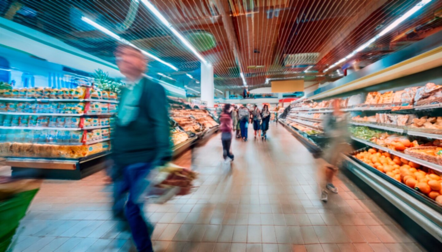 Blurry image of a supermarket aisle with shoppers moving quickly, creating a dynamic and busy atmosphere, ideal for retail or consumerism themes.; Shutterstock ID 2500928423