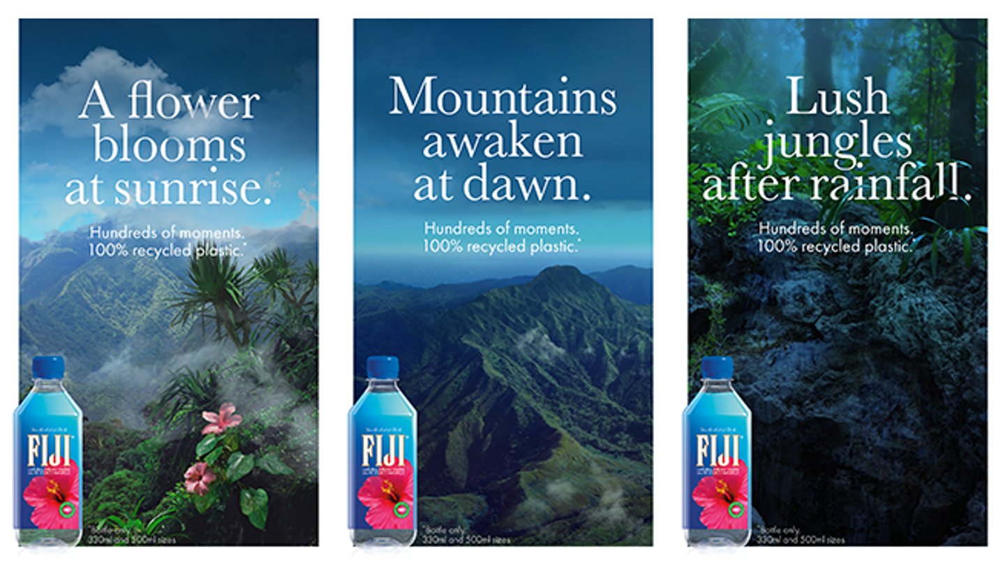 FIJI water bottles in front of water falls