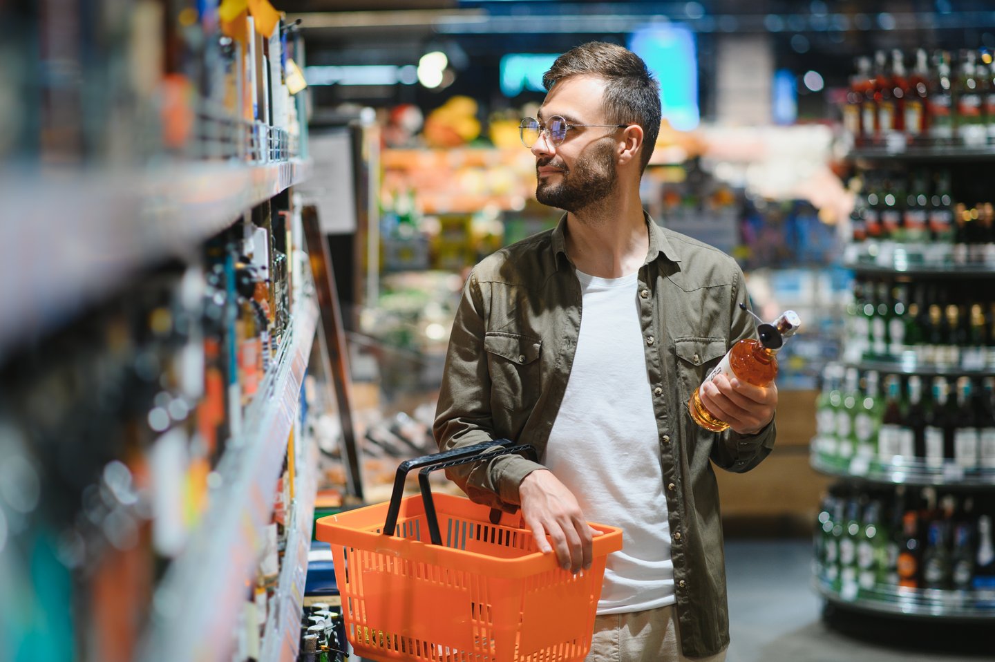 Man shopping for alcohol in grocery store