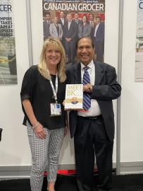 BK Sethi drops by the Canadian Grocer booth, here with Publisher, Vanessa Peters