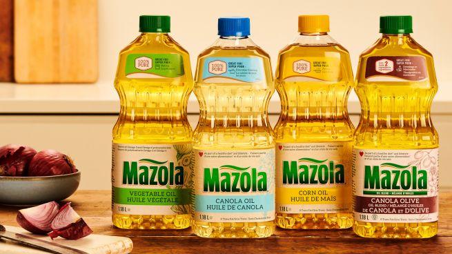 Lineup of Mazola® Cooking Oils on a kitchen counter