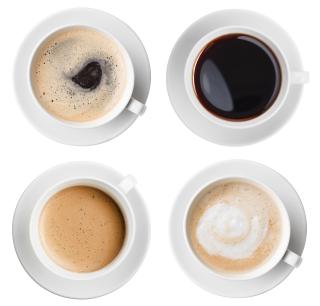 Four various coffee cups top view set isolated on white