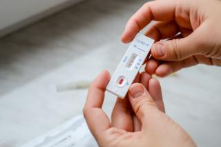 A patient with Covid-19 did an express test at home, the result is positive. Covid-19 test kit for detecting IgM IgG antibodies and immunity in 15 minutes.