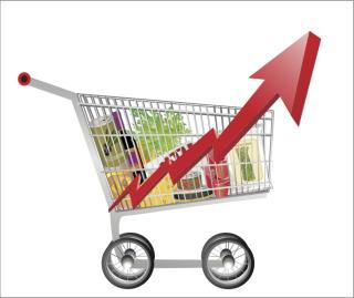 Concept. Basket with goods inside, a red sign with a chart indicate increase the prices food