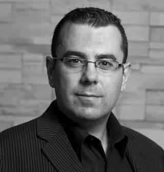 Black and white headshot of Mike Longo
