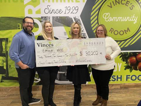 (L to R) Giancarlo Trimarchi and Maria Ciarlandini of Vince's Market with representatives from CMHA York Region and South Simcoe