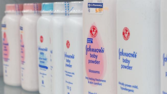 A store shelf lined with Johnson & Johnson talc products