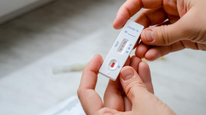 A patient with Covid-19 did an express test at home, the result is positive. Covid-19 test kit for detecting IgM IgG antibodies and immunity in 15 minutes.