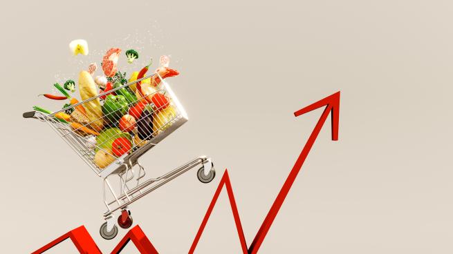 Food cost rising concept. Shopping cart full of groceries and red arrow pointing up 3D Rendering, 3D Illustration